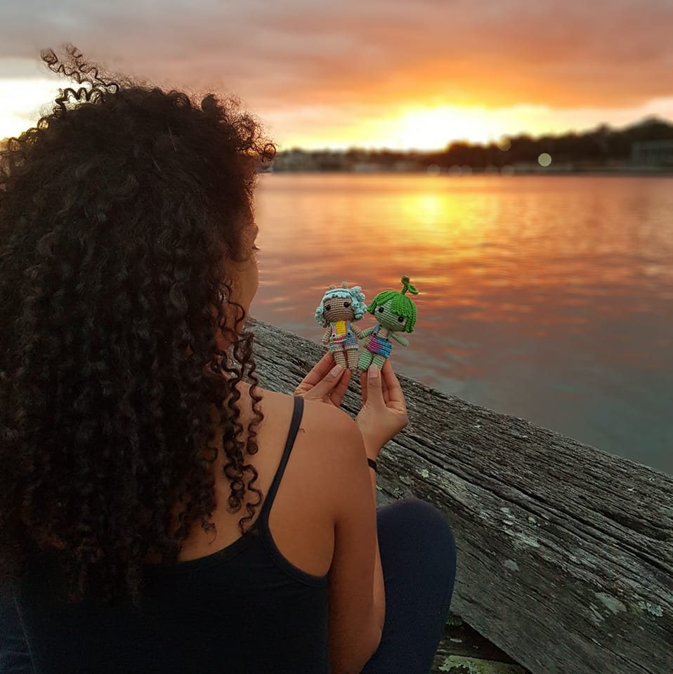 picture of Marina holding 2 crochet dolls